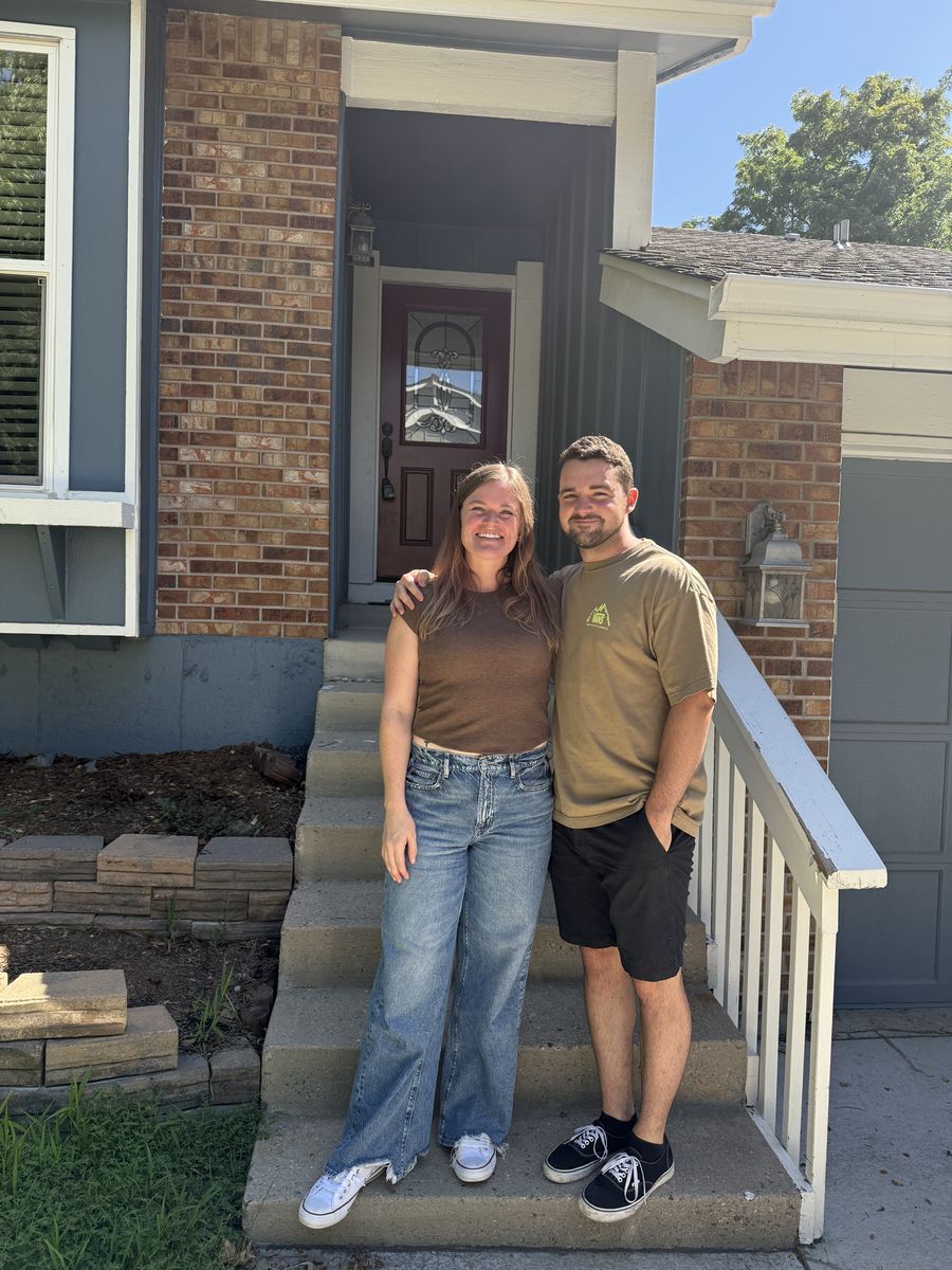 Maria and Avery outside their home
