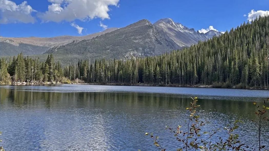 A still lake below the peaks in Rocky Mountain National Park